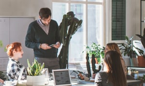 Employees discussing their Card Terms and Conditions