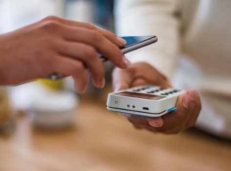 A Card Member using Mobile payments