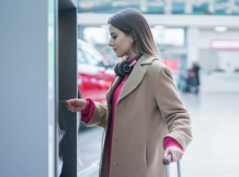A Card Member using an ATM