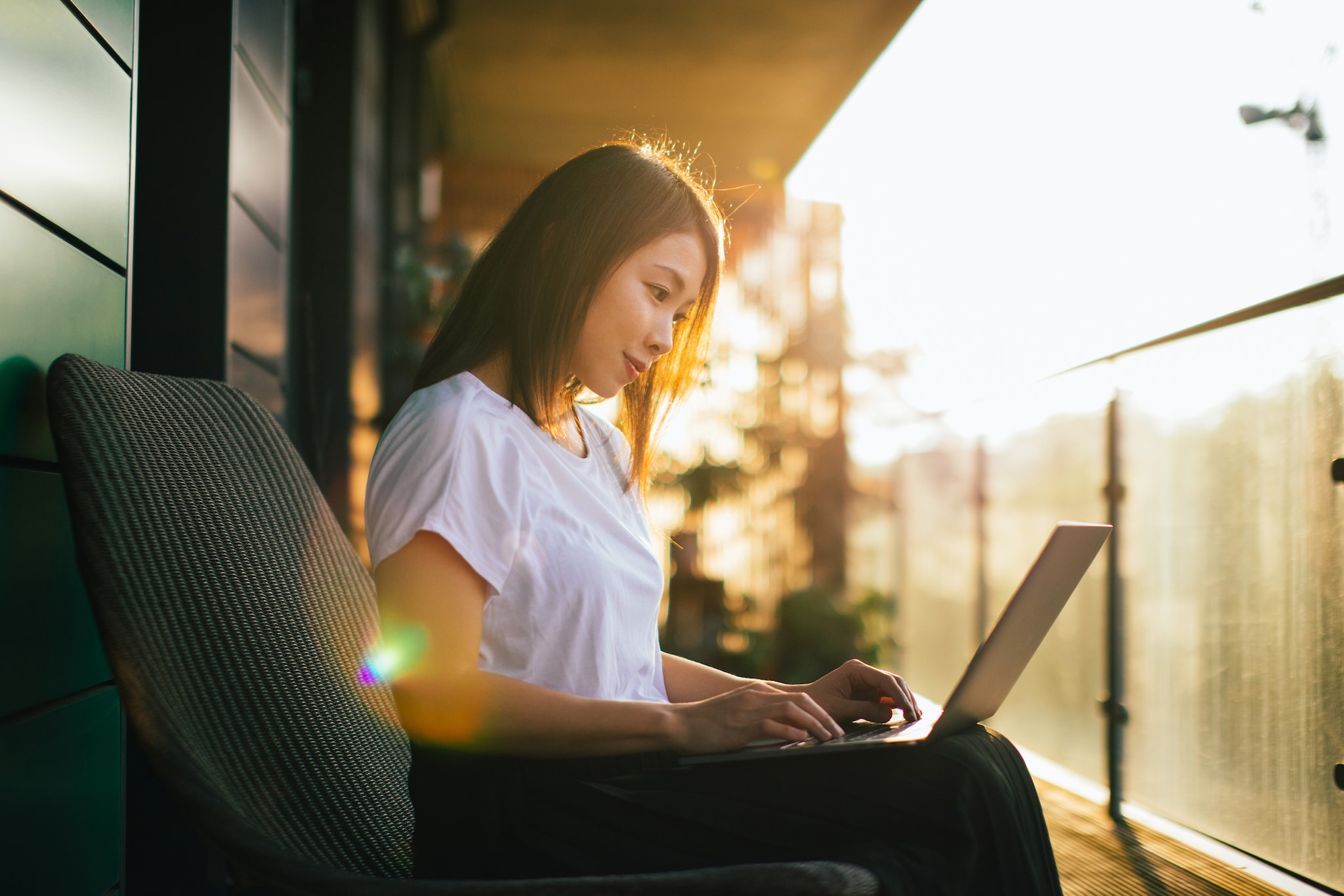  A lady looking at her laptop screen.
