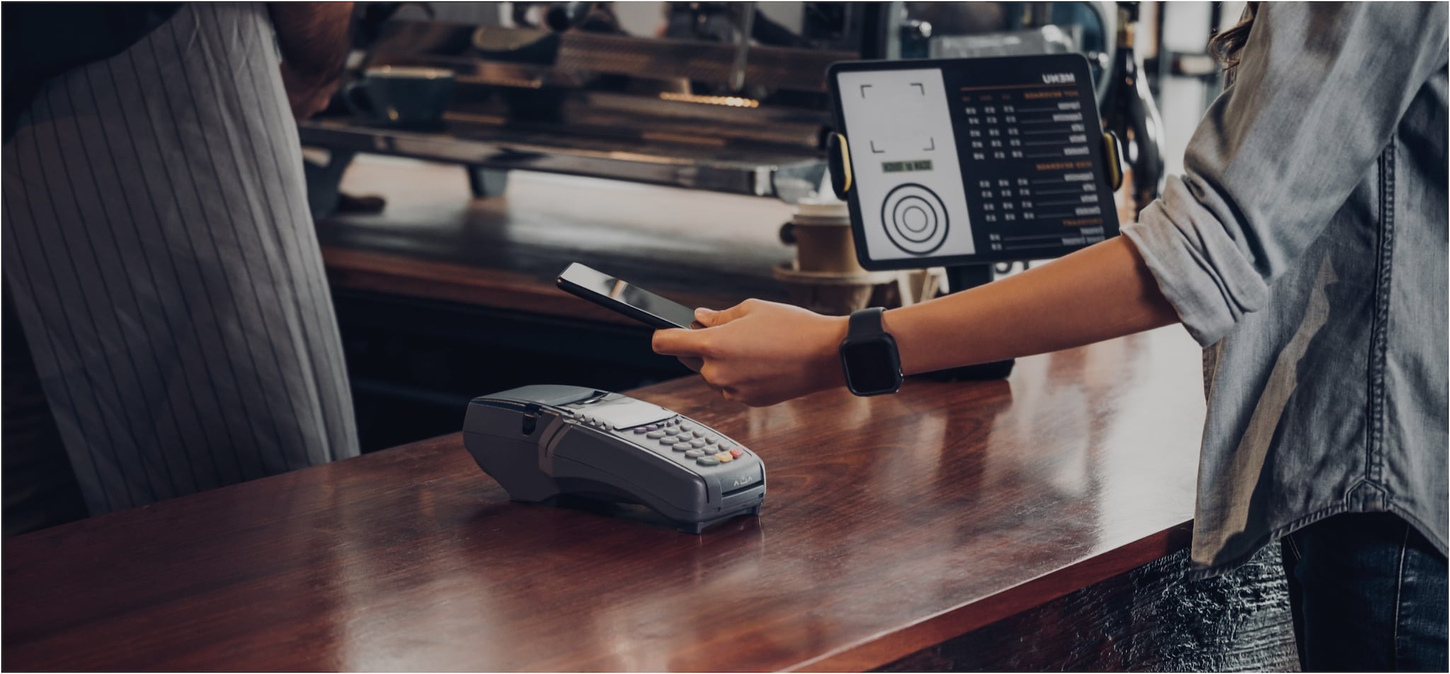 Woman buttering bread at restaurant 