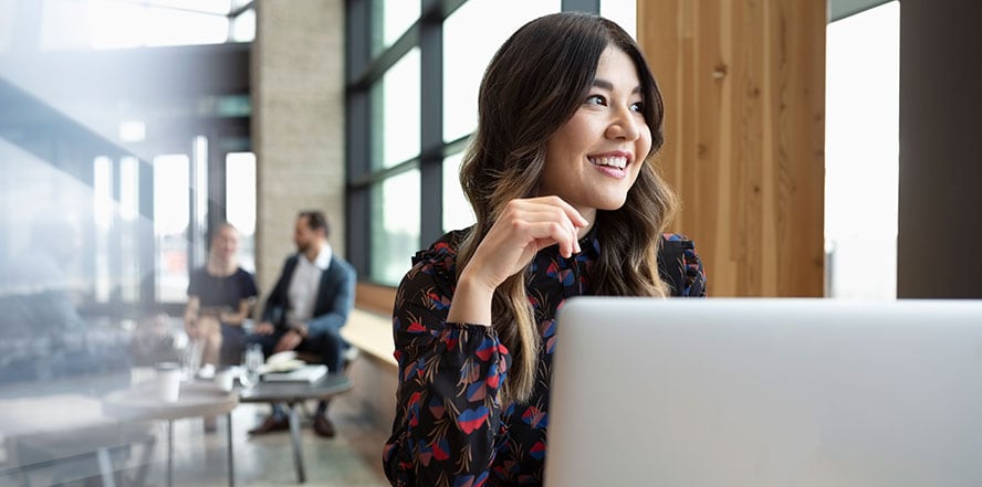 Woman smelling spices in a store