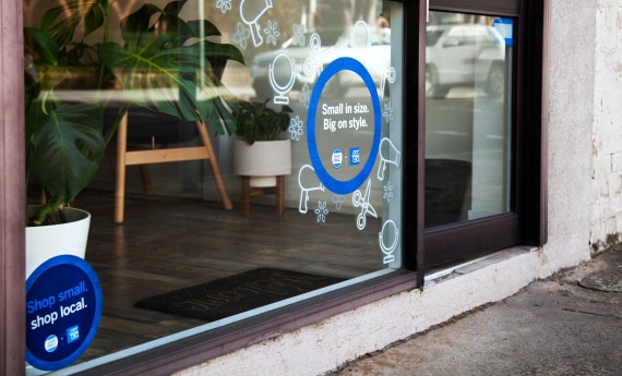 American Express signs in storefront window