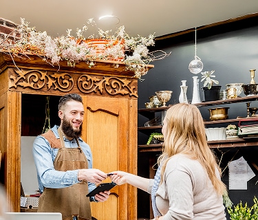 Customer paying at checkout