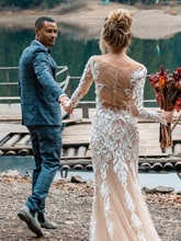 Couple eating popcorn in bed