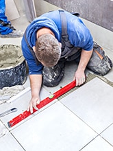 Couple eating popcorn in bed