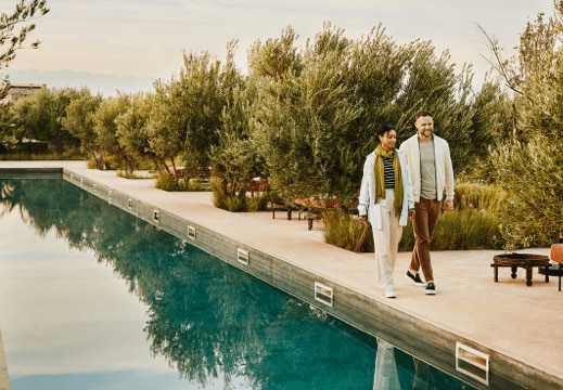 Two travellers strolling on holiday.