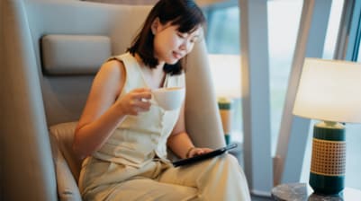 Individual sitting in airport lounge