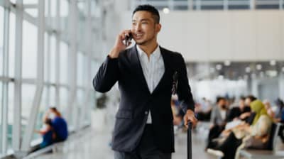 Individual walking through airport