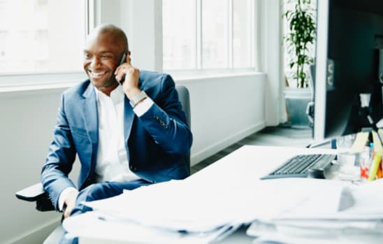 Individual on a phone call at work