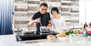couple cooking in a kitchen 