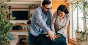 a couple packing their bag