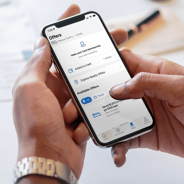 Close up of hands holding mobile device