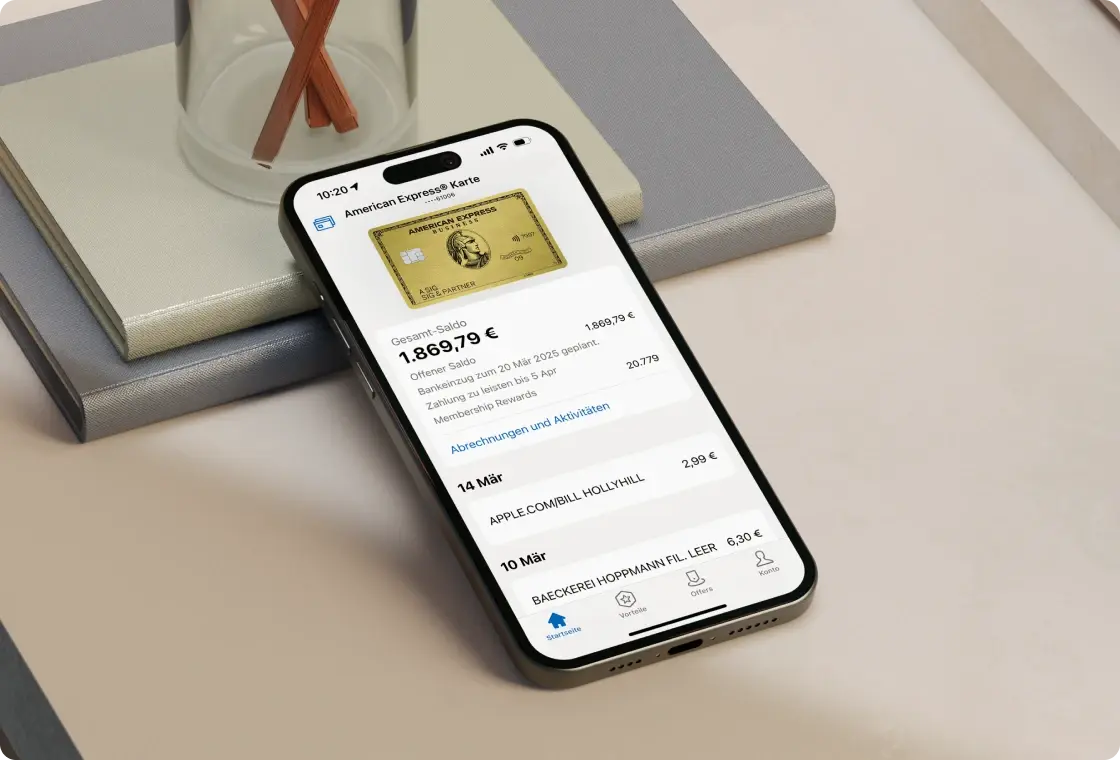 Smartphone zeigt American Express App mit geöffneter Kartenübersicht und Transaktionsdetails.