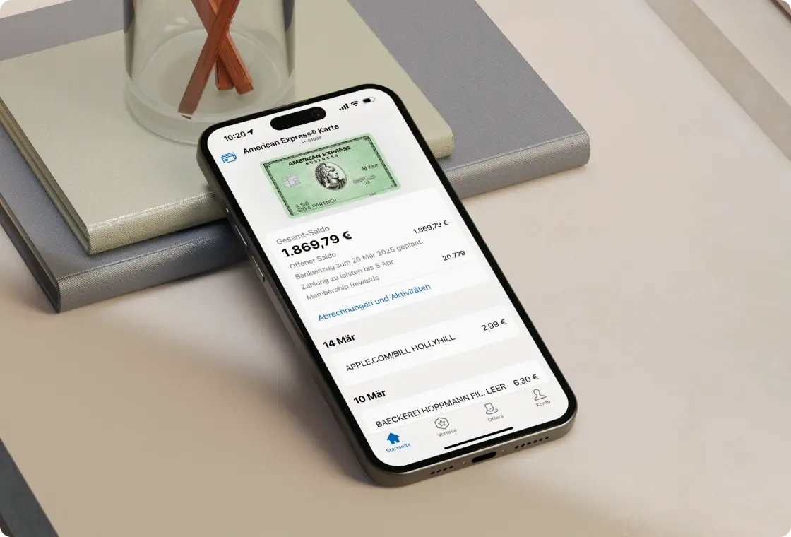 Smartphone zeigt American Express App mit geöffneter Kartenübersicht und Transaktionsdetails.