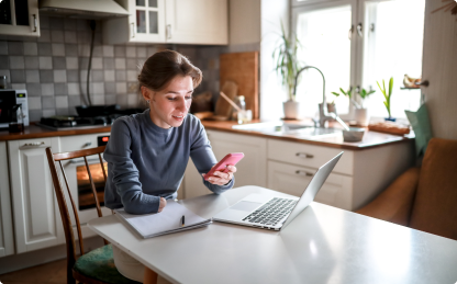 Woman upgrading her flight with her phone