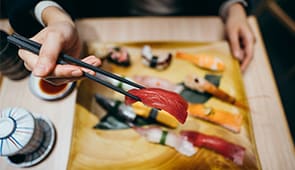 Person eating sushi