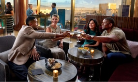 Group enjoying dinner with a view