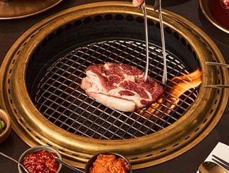 Delicately plated crudo on a bed of gazpacho