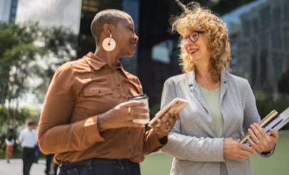 Two business owners in conversation.