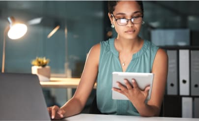 Businessperson using a tablet.