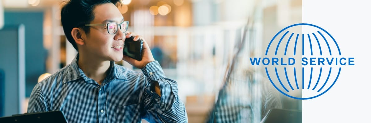 businessman smiling while on the phone