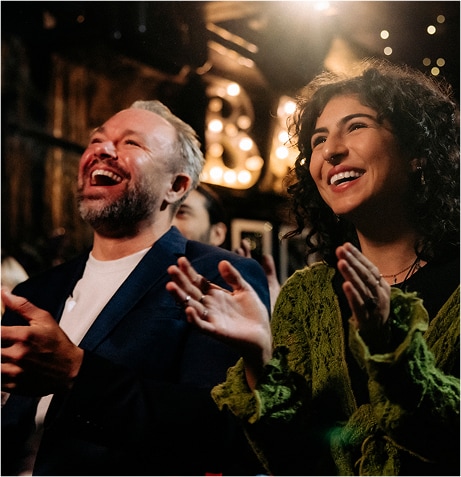 A person and person clapping