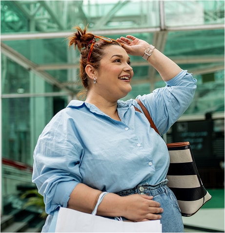 A person with her hand on her head