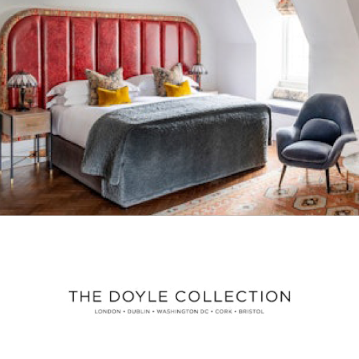 The Doyle Collection. London, Dublin, Washington DC, Cork, Bristol. A luxury hotel room featuring a large double bed with a large, red leather, quilted headboard.