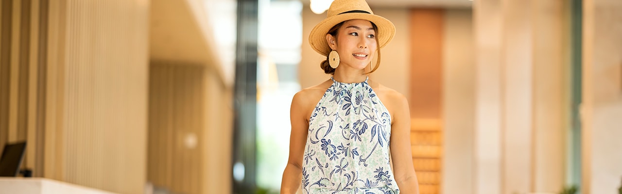 Woman checking in to hotel