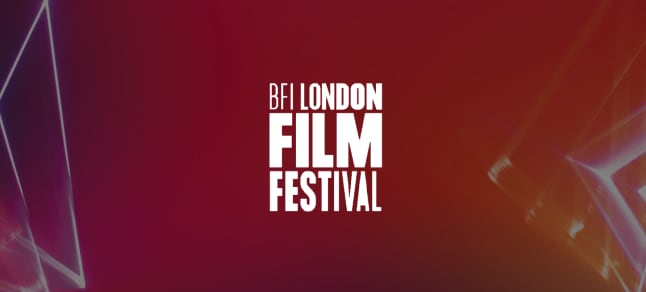 London Film Festival Logo over Red and pink laser lights at a concert