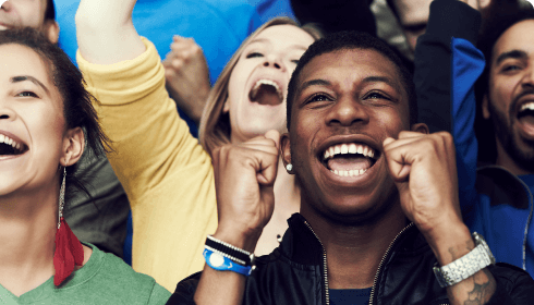 Crowd goers happily cheering