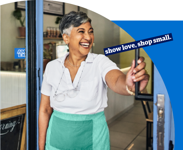 Merchant opening door of shop