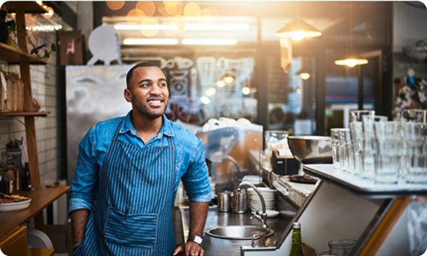 Person stands in a coffee shop