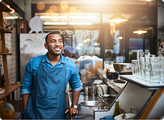 Person stands in a coffee shop