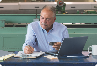 Business owner filling in form