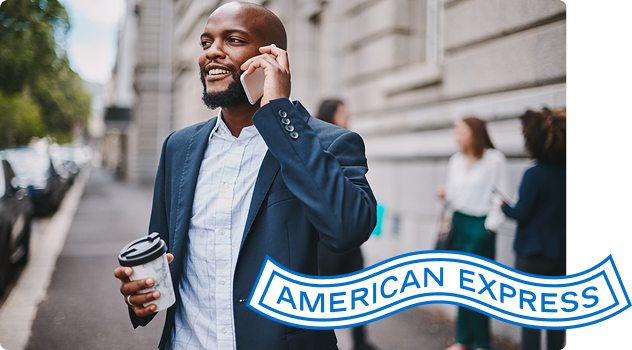 Person talks on phone while holding coffee