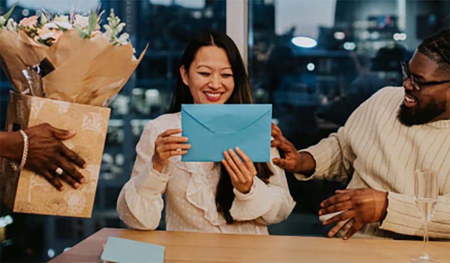 Woman opening a gift