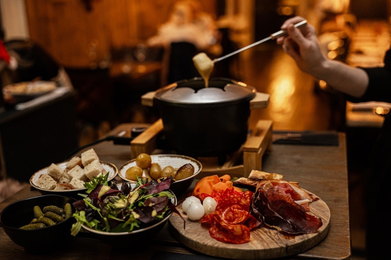 A table with winter food at The Chalet by Jimmy Garcia