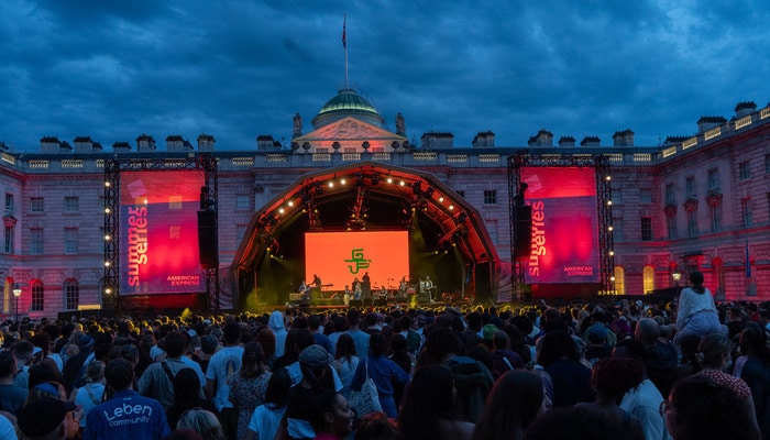 A crowd attending a concert at Somerset House's courtyard.