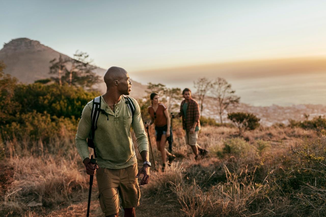 three people hiking