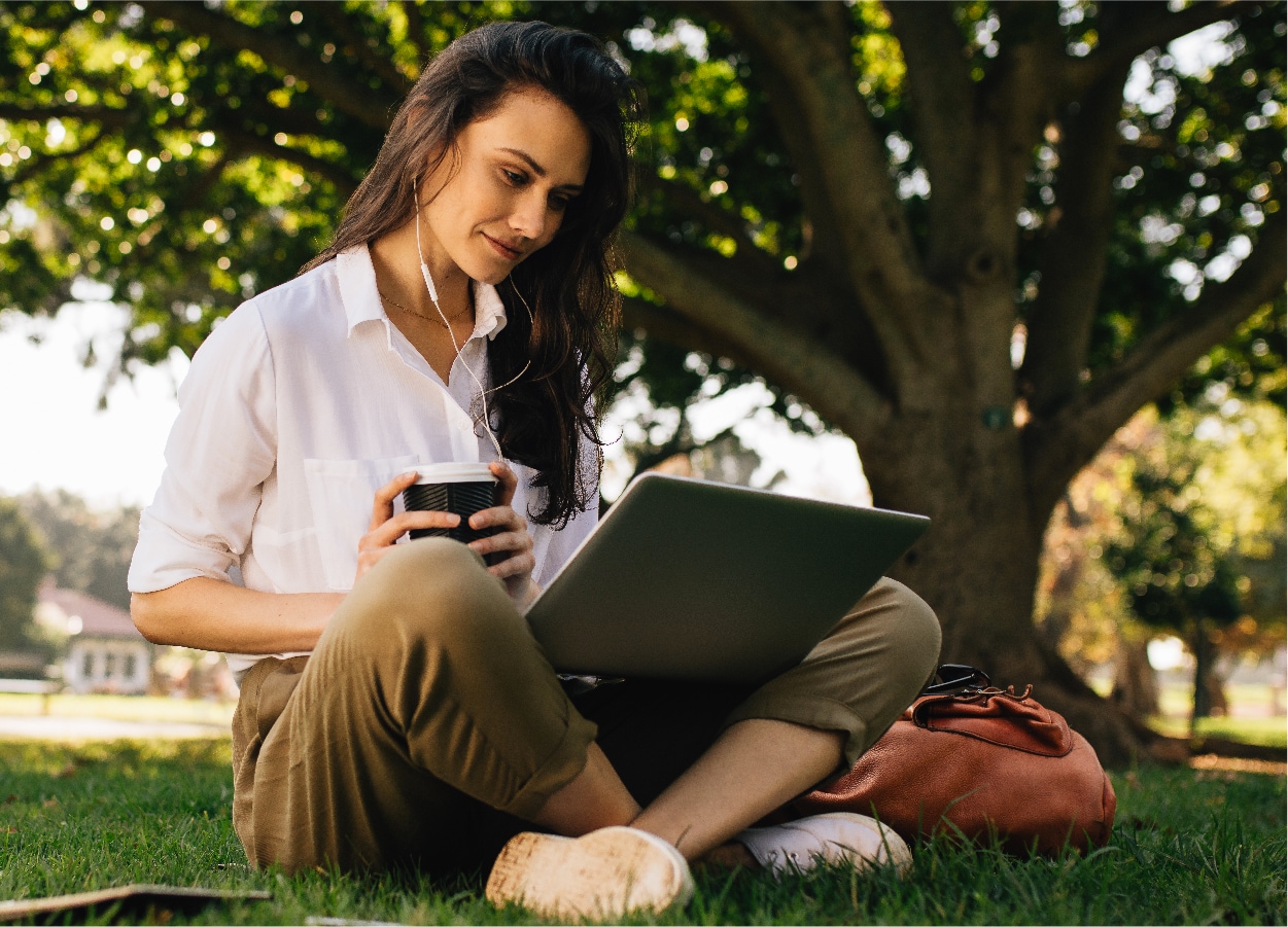 Woman on phone and laptop