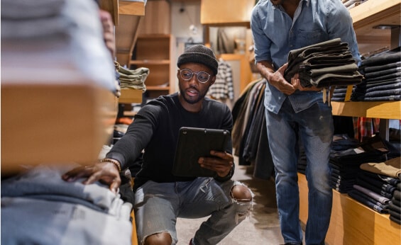 Two people in store looking at merchandise