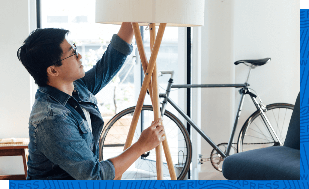 Man setting up new floor lamp