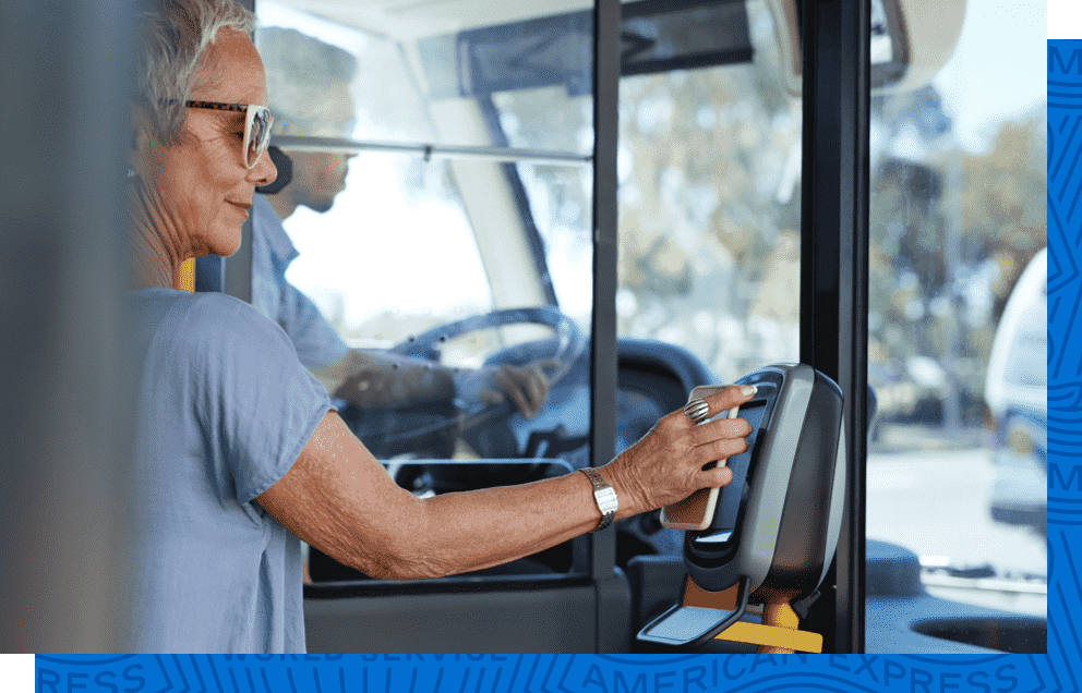 A Card Member using Google Pay to easily hop on a public bus.