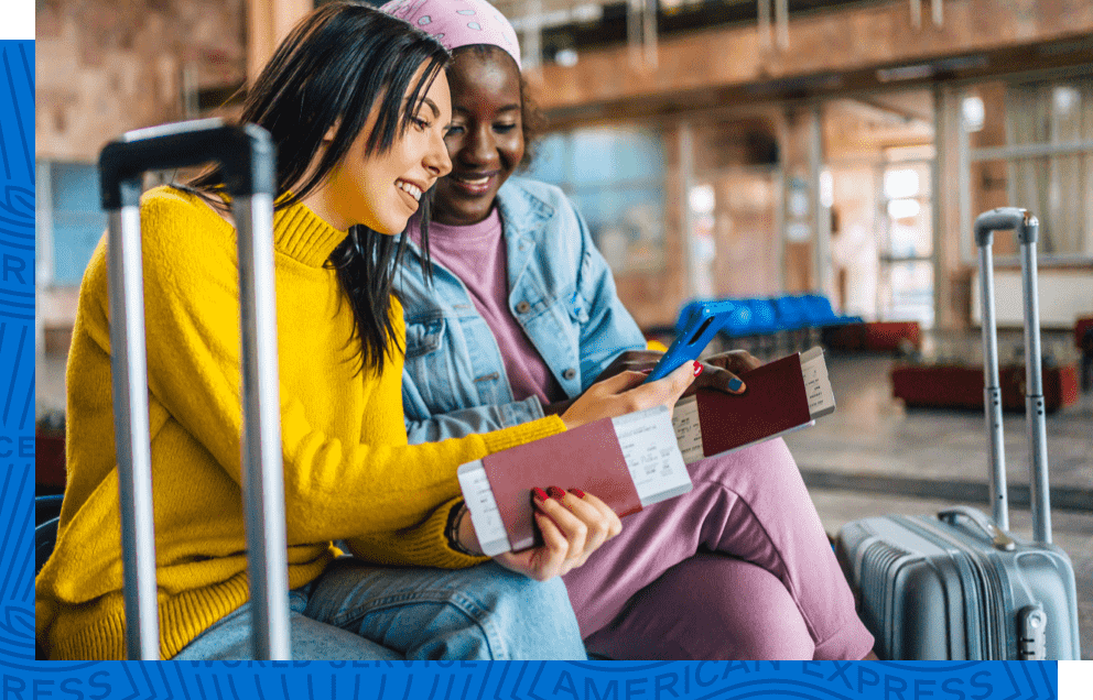 A pair of friends using Google Pay to book an experience during an international trip.