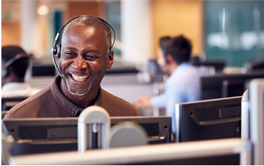 Businessperson wearing telephone headset