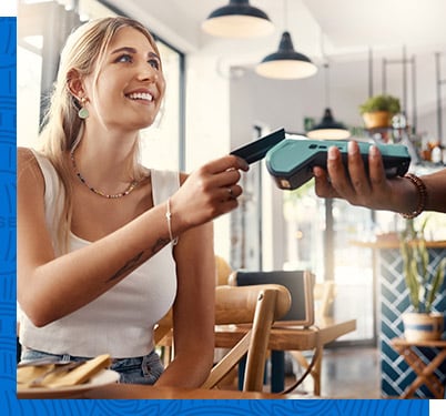 A woman using contactless payment