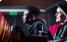 Two people watching a movie