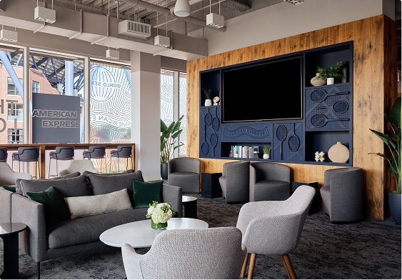 Interior seating area with couches, tables and chairs